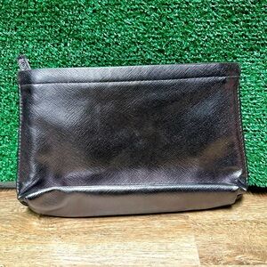 Lancôme Paris Bag -> make-up or travel bag. Copper color